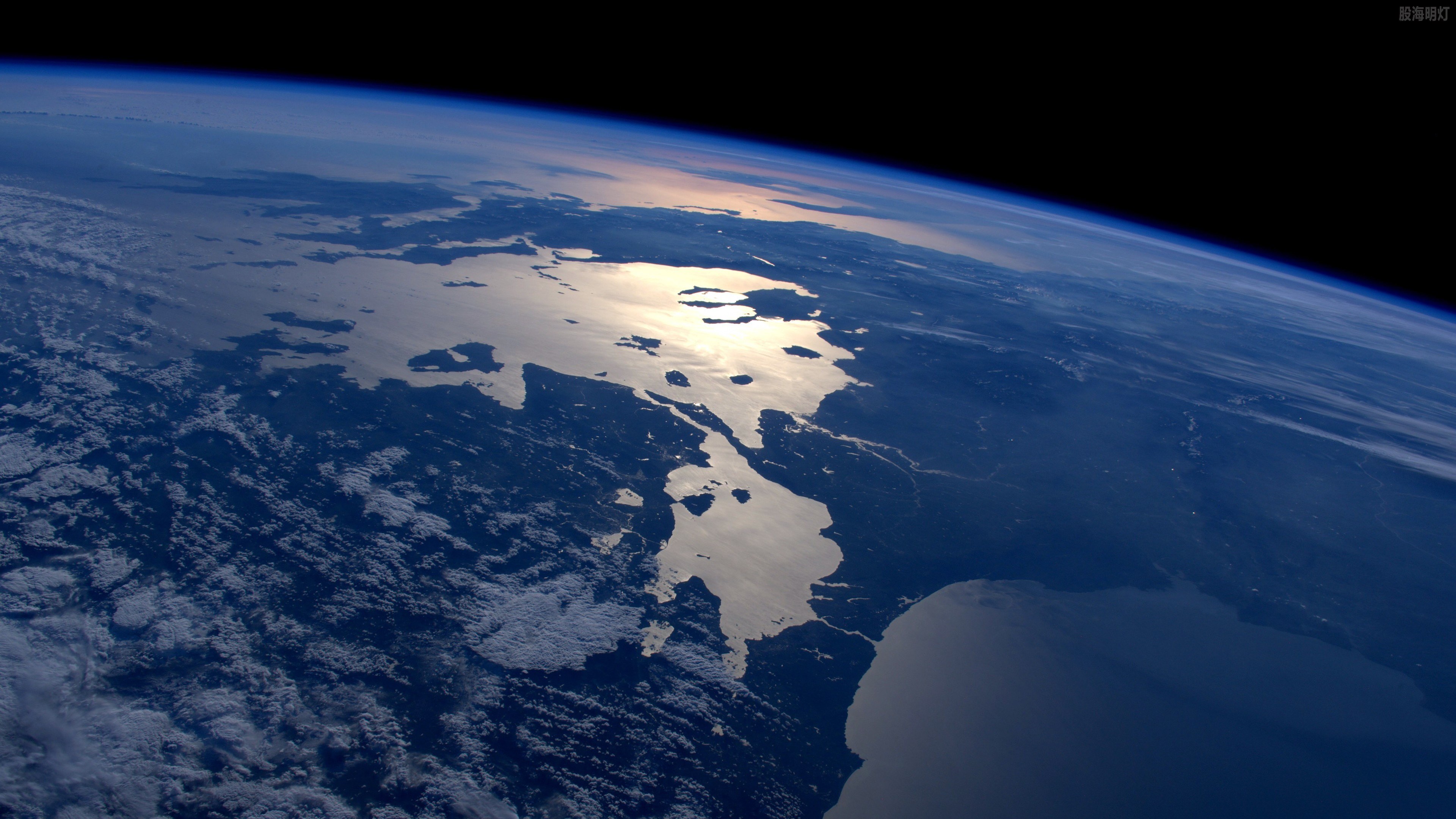 Earth-top-view-space-land-sea_3840x2160.jpg